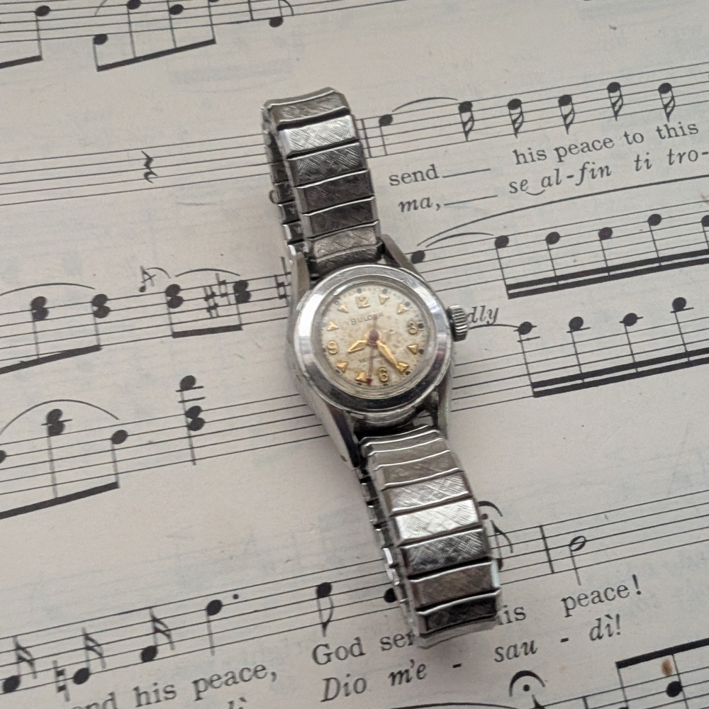 Bulova Silver Analog Watch with Gold Accents